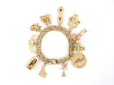 73824 - Circa 1960 Gold Pearl Enamel Assorted Travel Charm Bracelet
