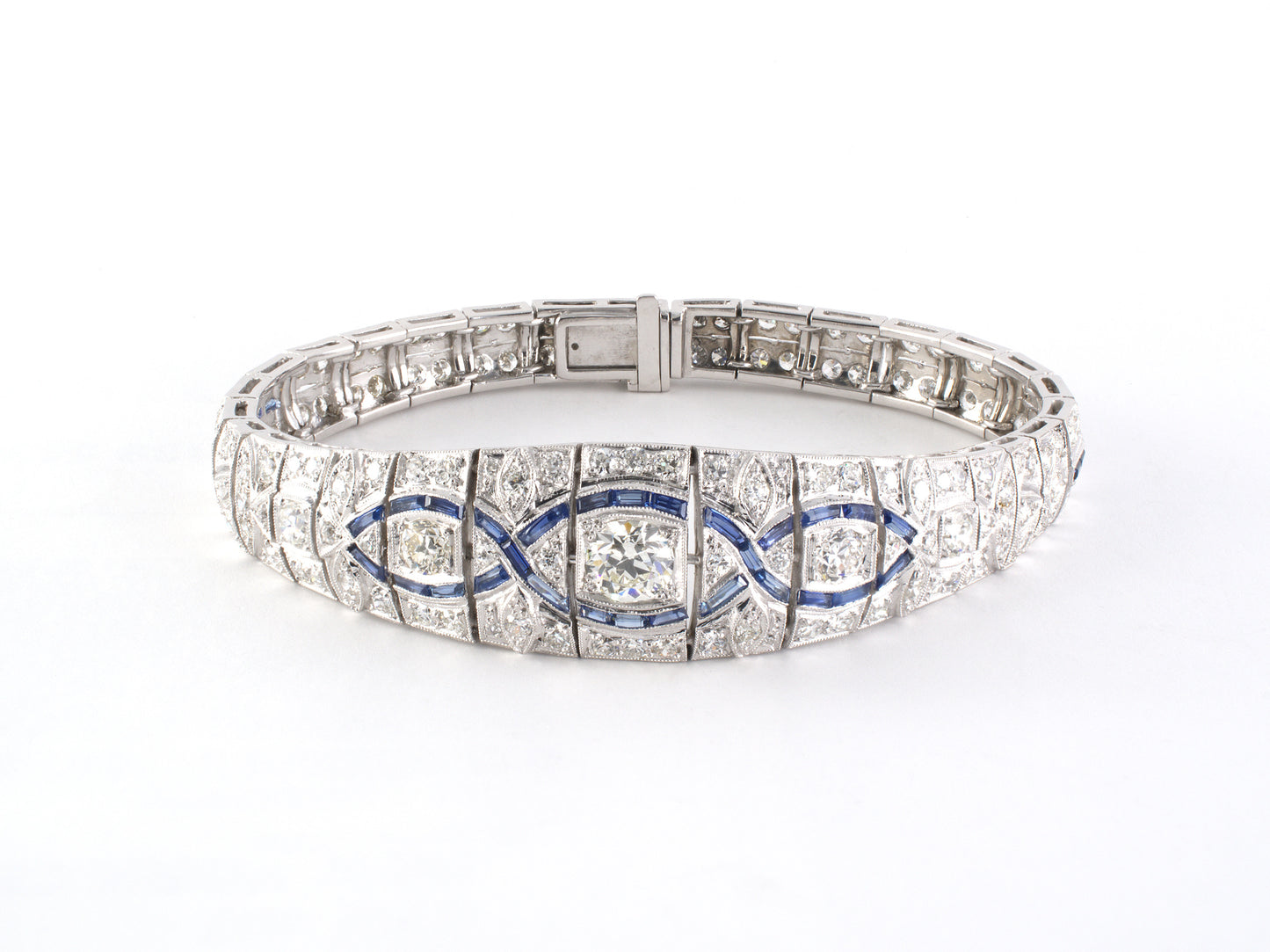 73920 - Art Deco Platinum Diamond Calibre Sapphire Tapered Airline Bracelet