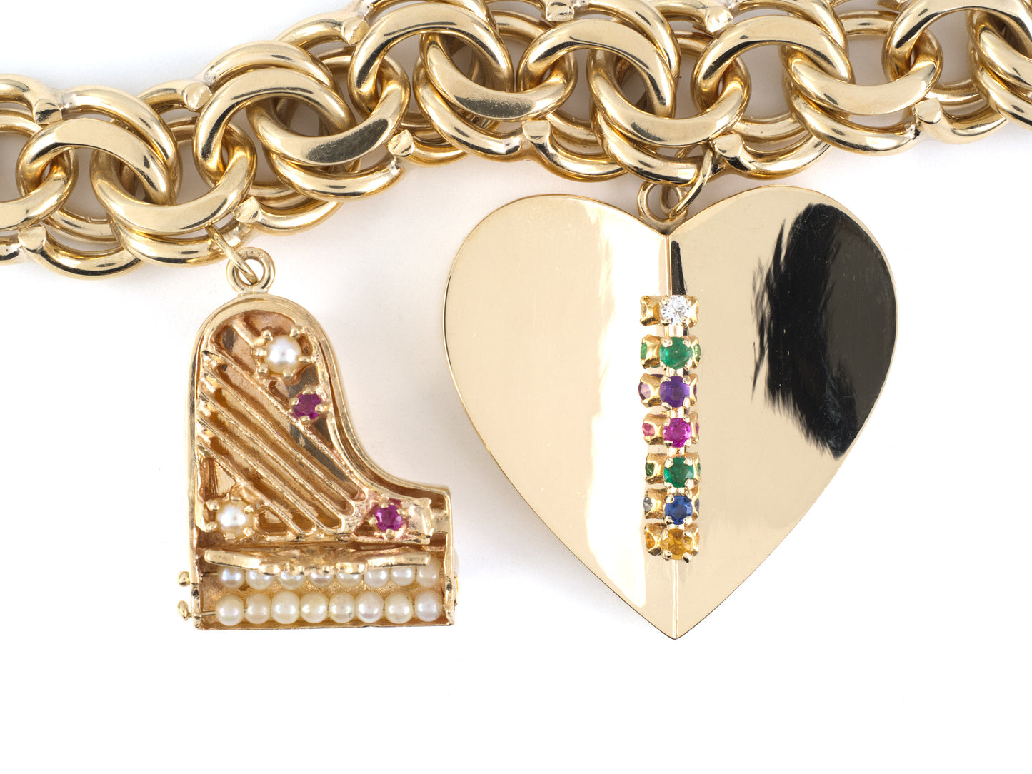 73922 - Circa 1945 Gold Pearl Diamond Emerald Ruby Amethyst Sapphire Topaz Spiral Curb Link 2-Charm (Piano & Heart) "DEAREST" Acrostic Bracelet