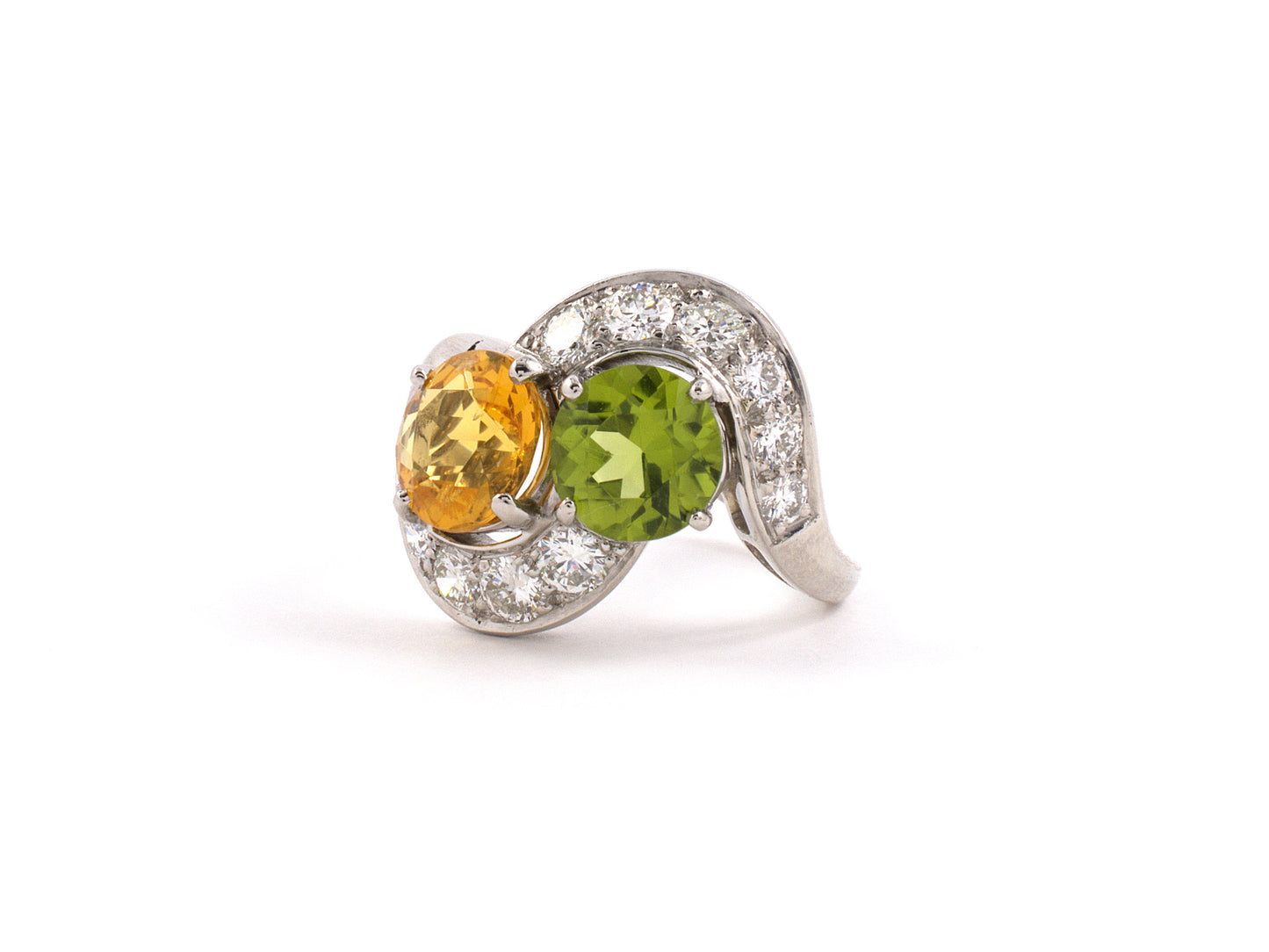 92481 - Circa 1950s Platinum Diamond Yellow Beryl Peridot By Pass 2-Stone Ring