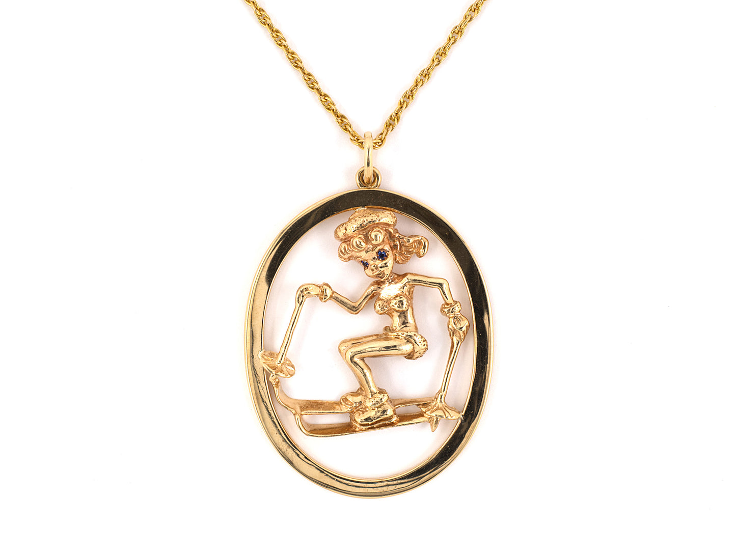 43007 - Circa 1970s Ruser Gold Sapphire Skier Pendant
