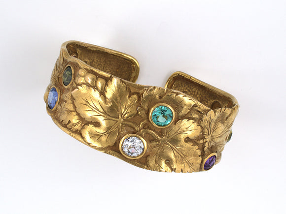 71773 - Art Nouveau Manz Gold Sapphires, Peridot, Zircon, Garnet, Amethyst Grape Leaf Cuff Bracelet
