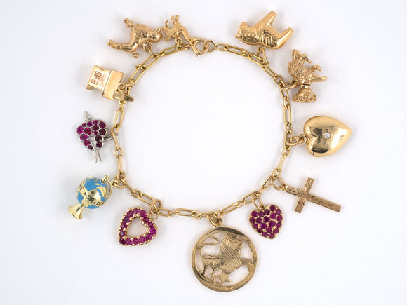 73204 - SOLD - Circa1960s Cartier Gold Diamond Ruby Charm Bracelet