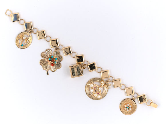 73443 - Circa 1950 Gold Charm Bracelet