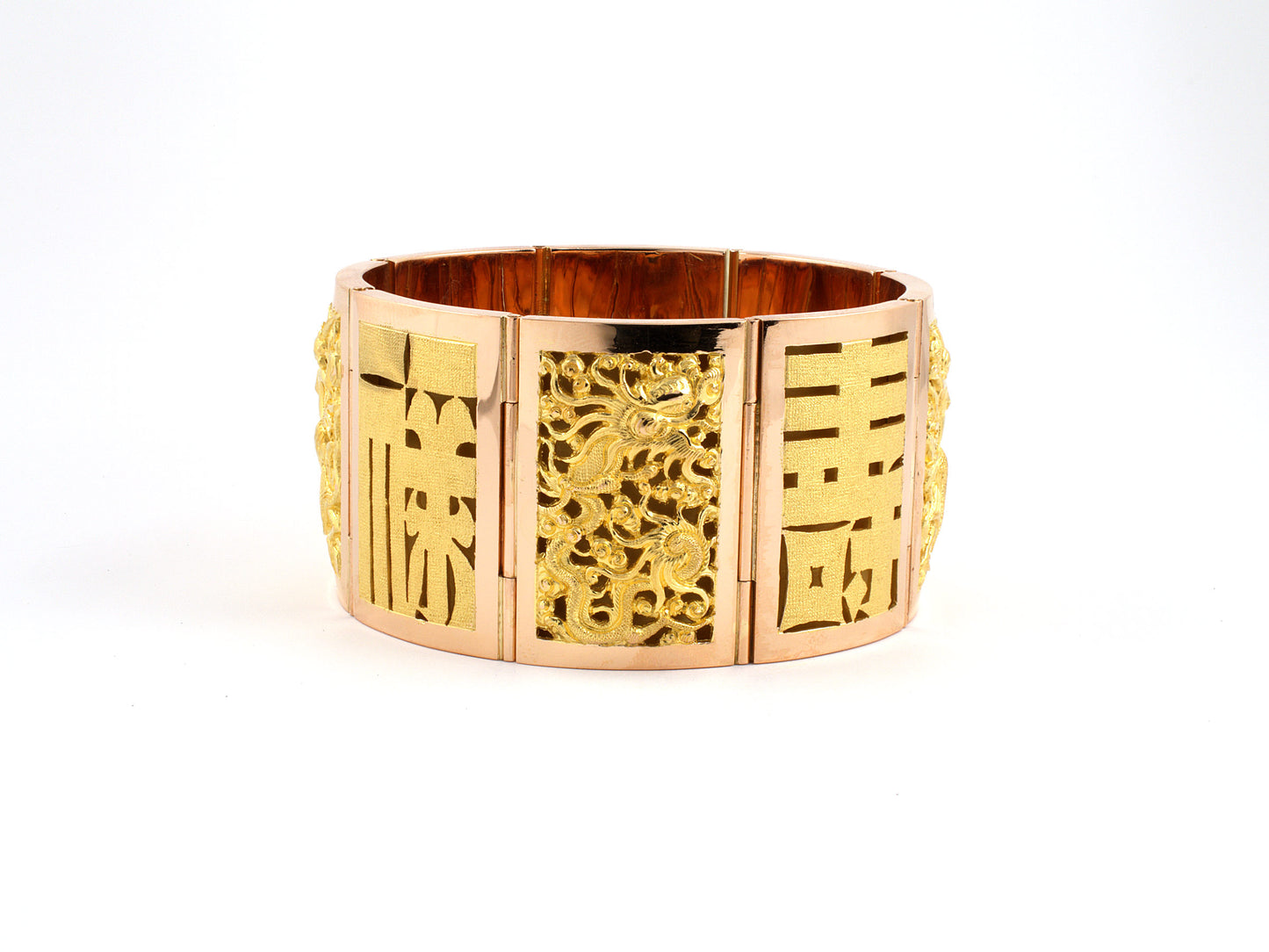 73800 - Circa 1950s Gold Carved Chinese Design Hinged Panel Wisdom/Happiness Wealth Longevity Health Bracelet