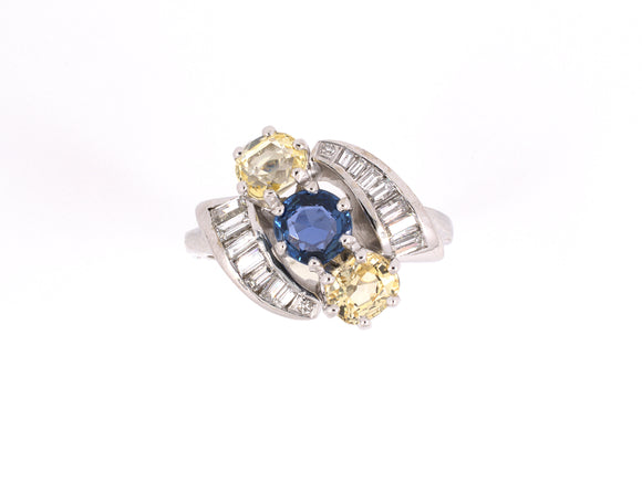90829 - Circa 1950s Gold Diamond Blue Sapphire Yellow Sapphire 3-Stone Twist Ring