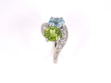 92498 - Circa 1950s Platinum Diamond Peridot Aqua By Pass 2-Stone Ring