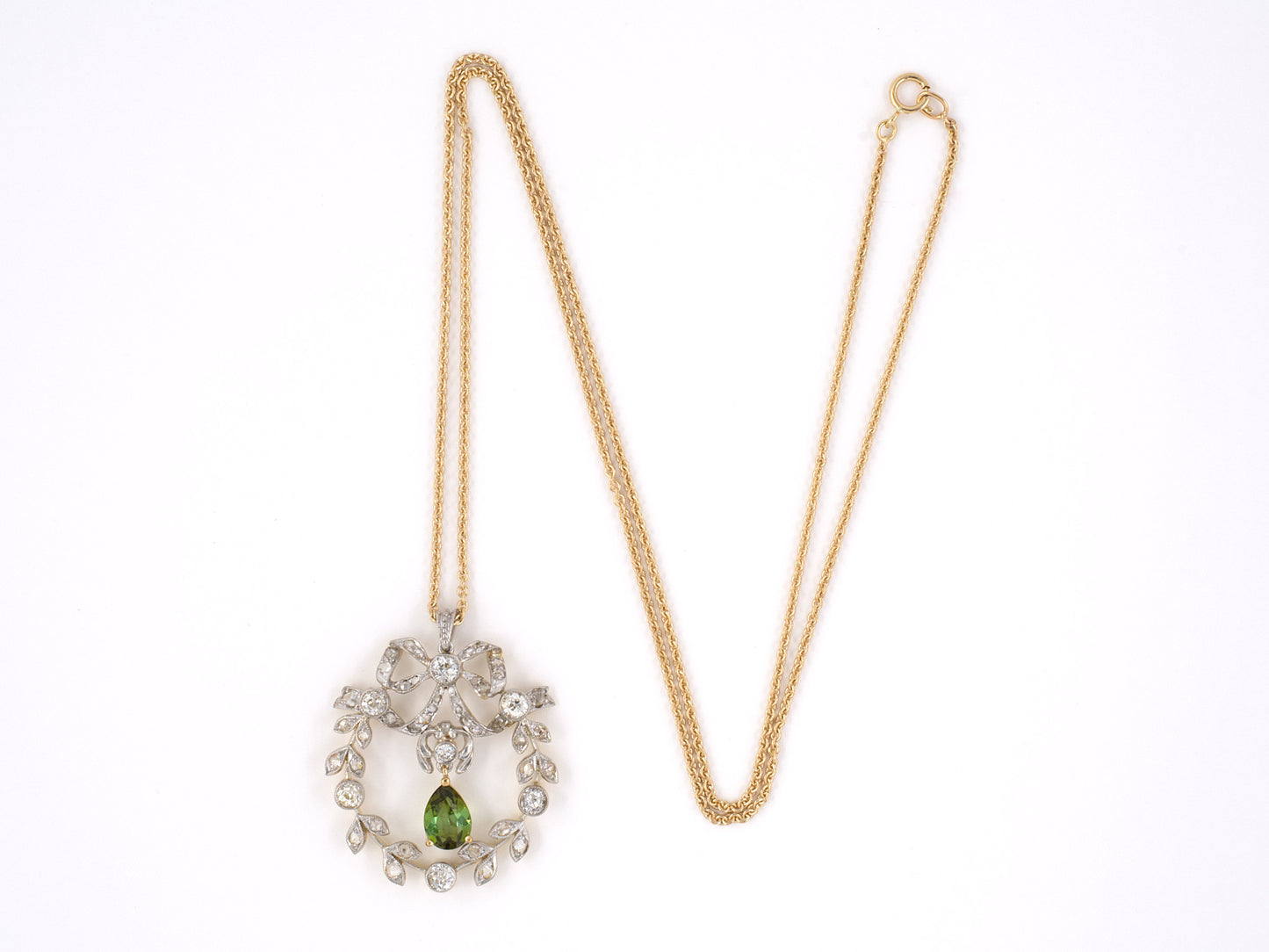 45205 - Edwardian Platinum Gold Tourmaline Diamond Leaf And Bow Wreath Pendant With Cable Chain