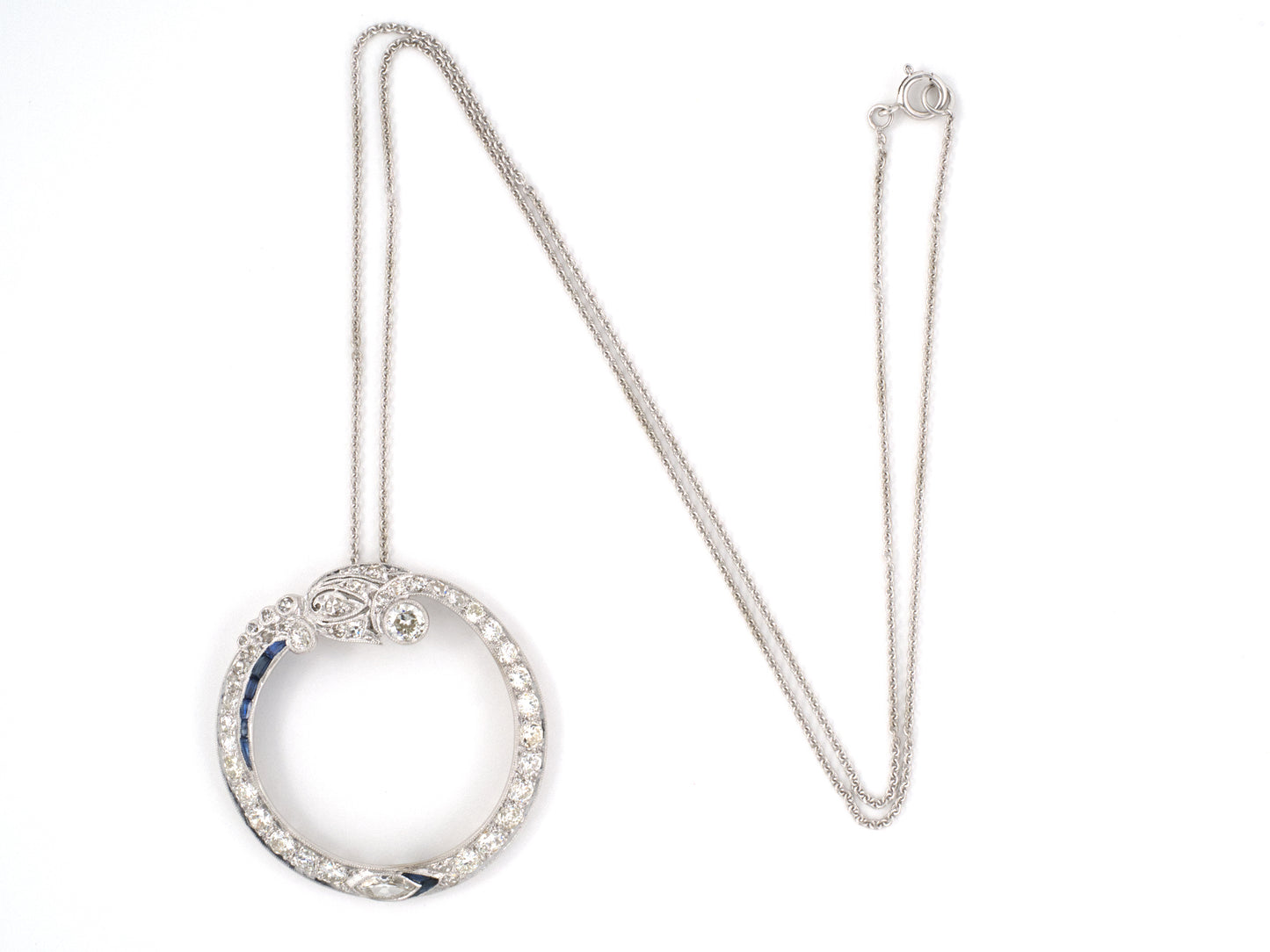 45535 - Art Deco Platinum Diamond Sapphire Circle Wreath Pendant Necklace