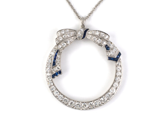 45570 - Art Deco Platinum Diamond Sapphire Bow Ribbon Circle Pendant Necklace