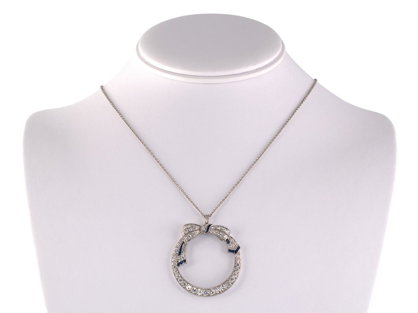 45570 - Art Deco Platinum Diamond Sapphire Bow Ribbon Circle Pendant Necklace
