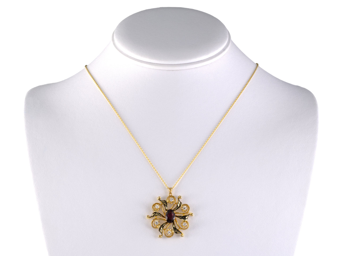 45716 - K. Goldschmidt Gold Diamond Garnet Black Enamel Pinwheel Pendant Necklace