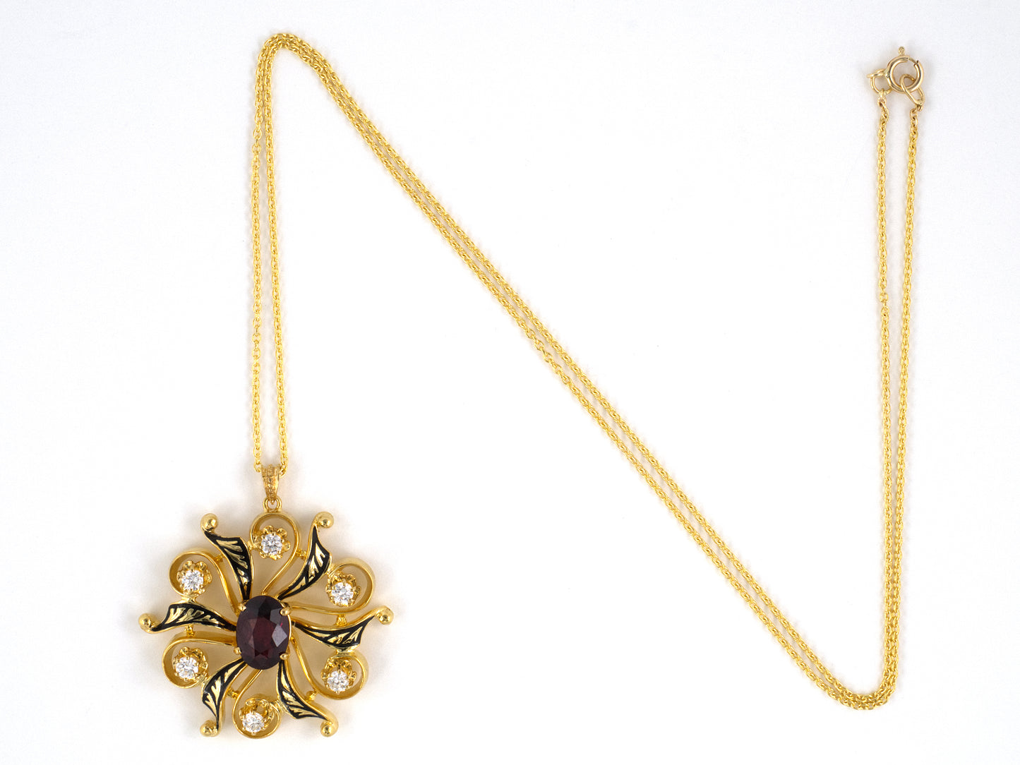 45716 - K. Goldschmidt Gold Diamond Garnet Black Enamel Pinwheel Pendant Necklace