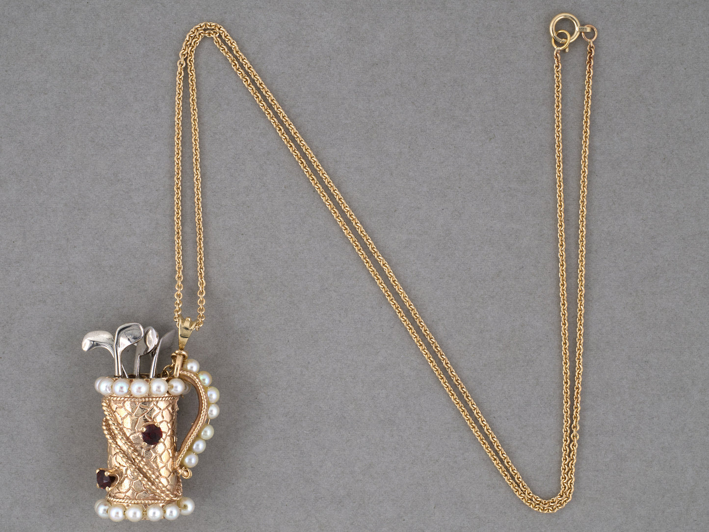 45725 - Gold Pearl Garnet Golf Bag & Clubs Carved Pendant Necklace