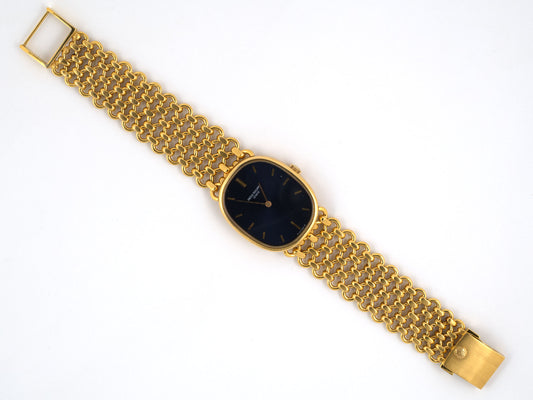 61315 - SOLD - Circa 1972 Patek Philippe Gold Ellipse Blue Face Watch