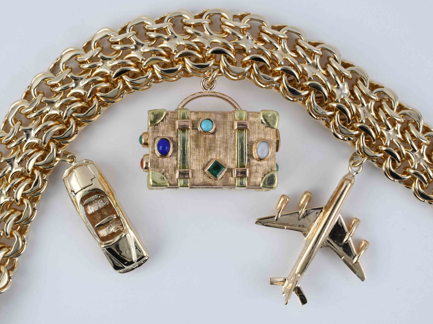 73529 - SOLD - Circa 1950s Gold Spiral Link Trunk Airplane Car Travel Bracelet