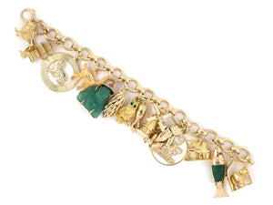 73764 - SOLD - Circa 1960s Gold Ruby Aventurine14 Assorted Animal Travel Charm Bracelet