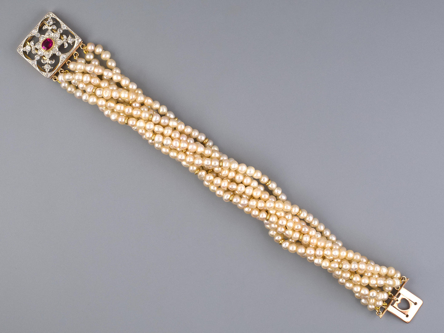 73829 - Victorian Silver On Gold Ruby Diamond Clasp Natural Pearl 8 Strand With Rondel Torsade Bracelet