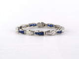 73910 - Oscar Heyman Platinum Diamond Calibre Sapphire Wave Line Bracelet