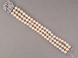 73938 - Circa 1960s Platinum Diamond Akoya Pearl 3-Row Swirl Ribbon Bracelet