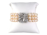 73938 - Circa 1960s Platinum Diamond Akoya Pearl 3-Row Swirl Ribbon Bracelet