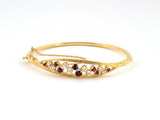 73975 - Circa 1976 English Gold Ruby Diamond Bangle Bracelet