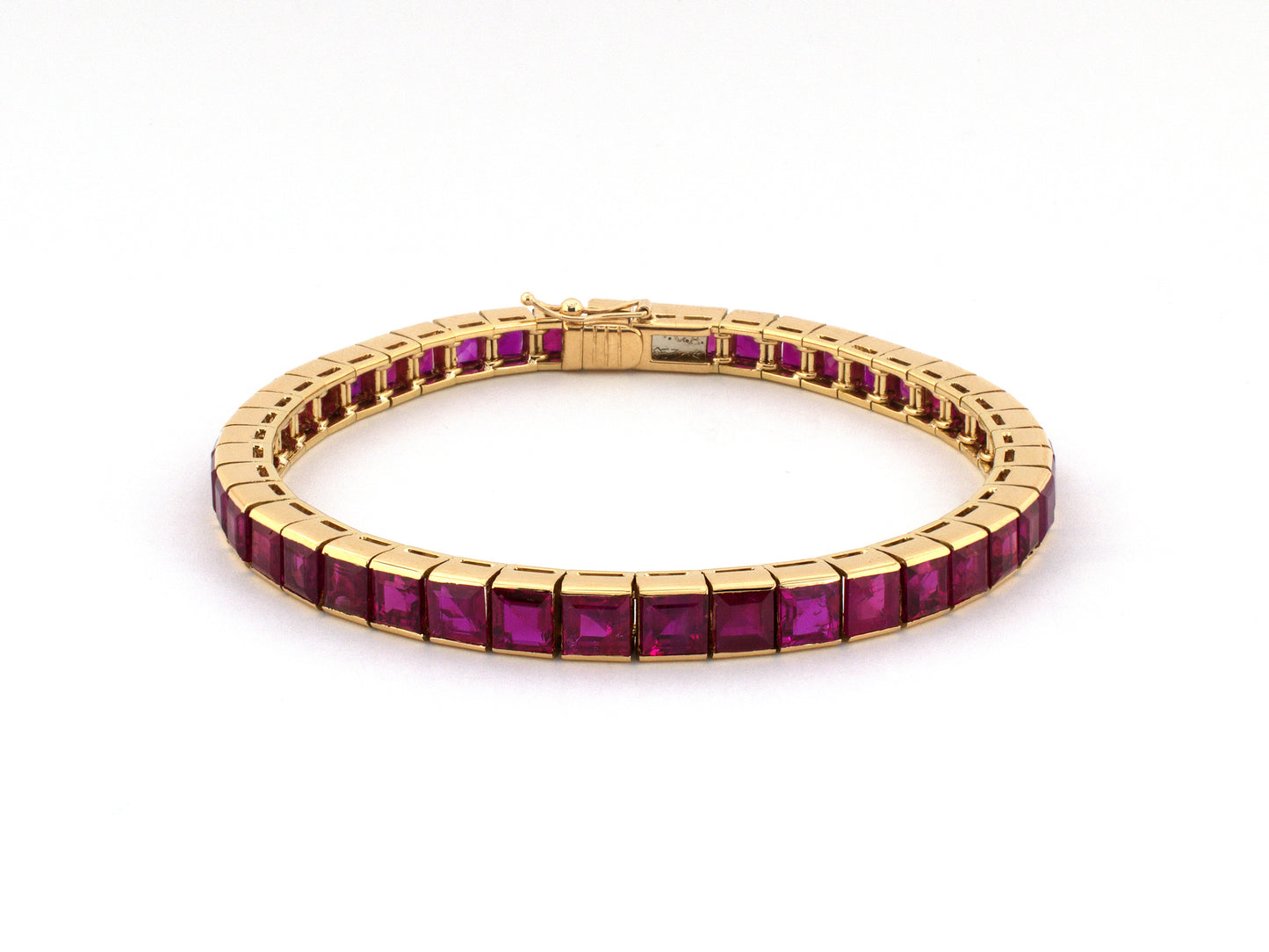 73976 - Van Cleef & Arpels France Gold Burma Ruby Tapered Straight Line Bracelet