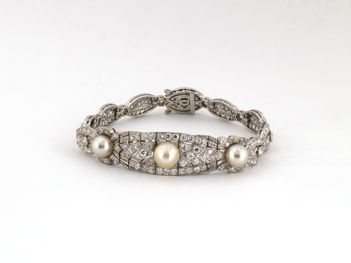 73990 - Art Deco T Kirkpatrick & Co Platinum Diamond GIA Natural Pearl Emerald Bracelet