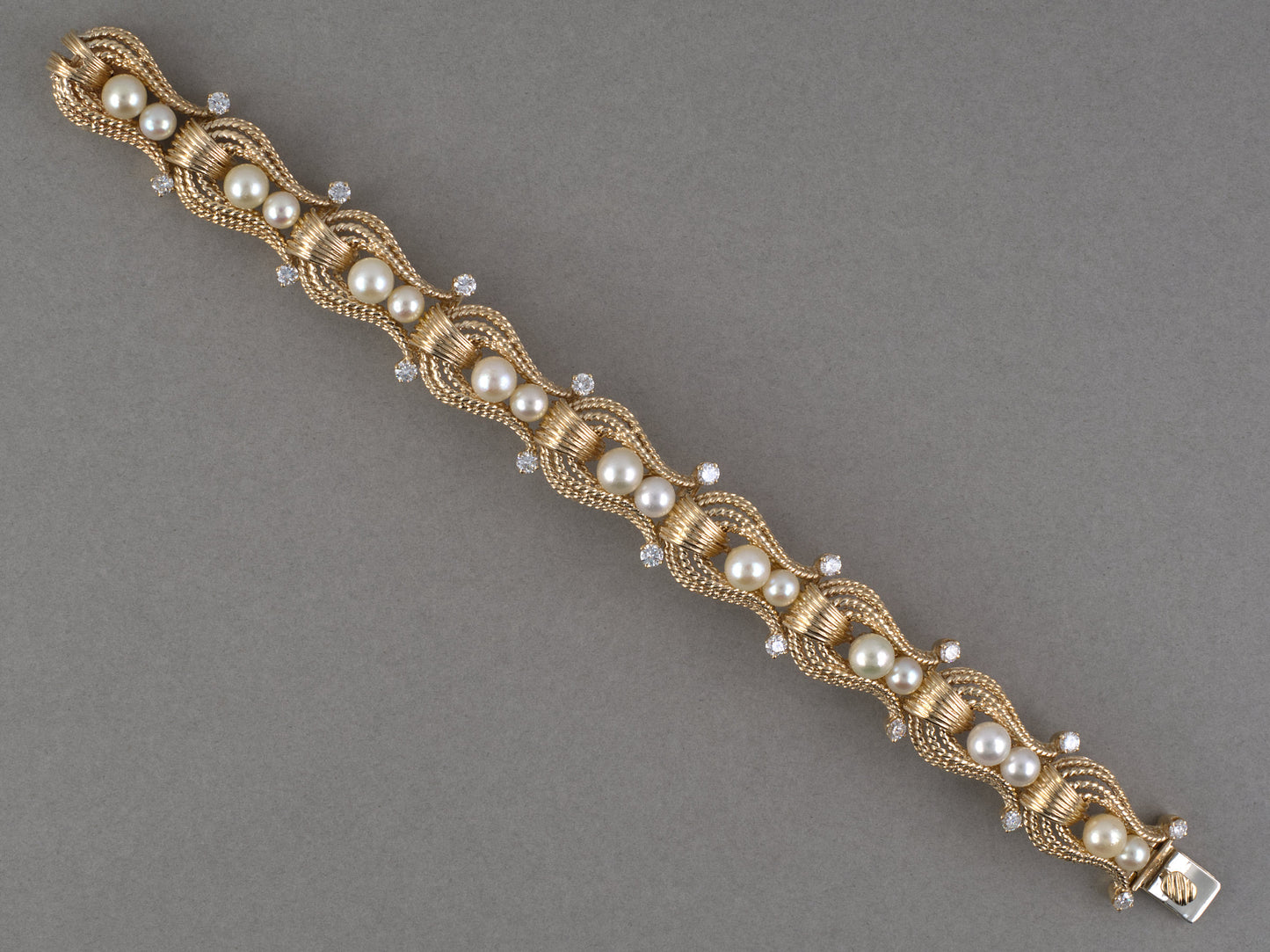 74013 - Circa 1960 Gold Pearl Diamond Omega Rope Bracelet