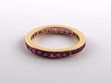 902164 - Gold Ruby Channel Set Eternity Ring