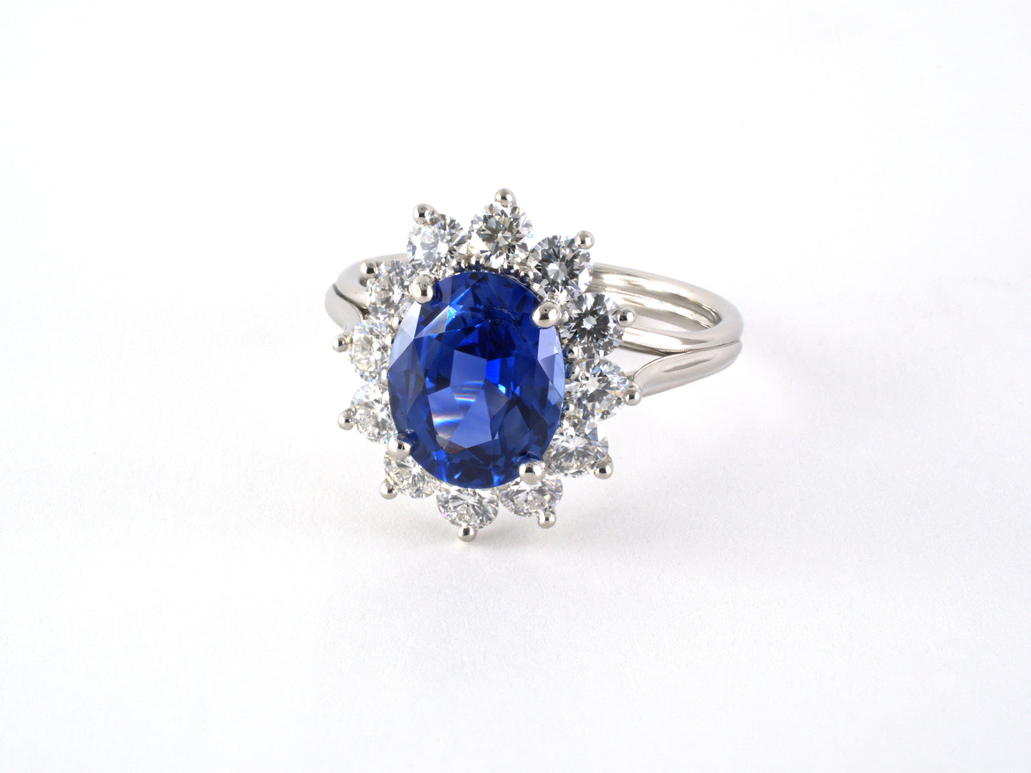 902282 - Platinum AGL Sapphire Diamond Cluster Ring