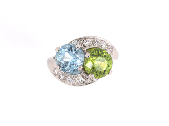 92498 - Circa 1950s Platinum Diamond Peridot Aqua By Pass 2-Stone Ring