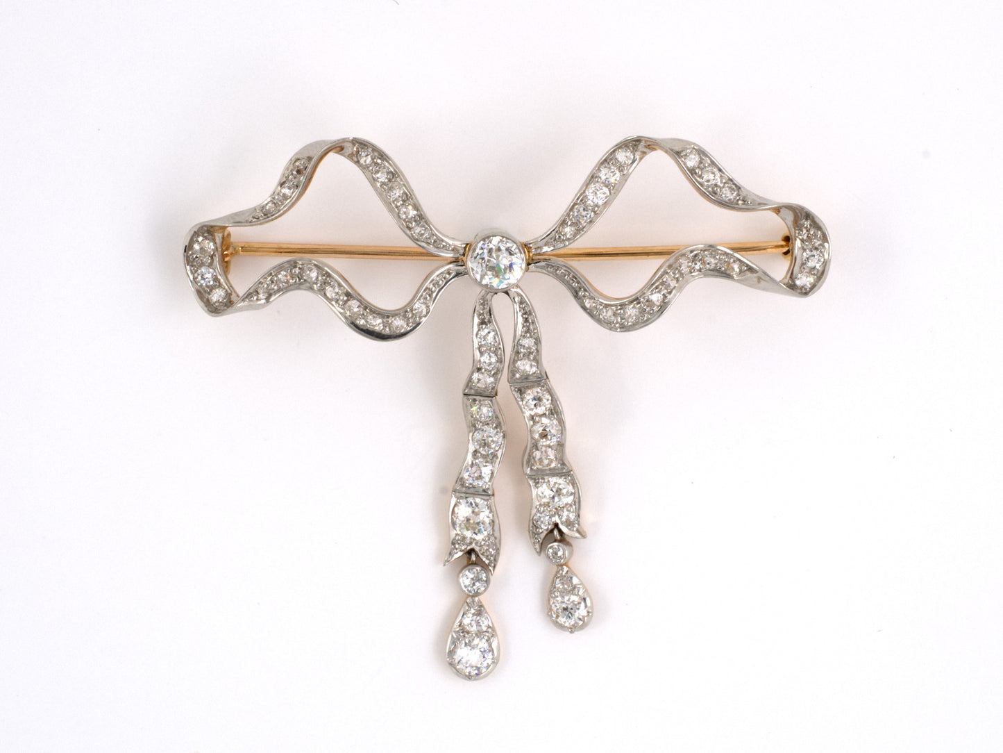 23138 - SOLD - Edwardian Platinum Gold Diamond Flexible Bow Pin