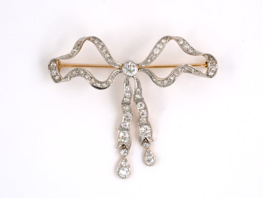 23138 - SOLD - Edwardian Platinum Gold Diamond Flexible Bow Pin