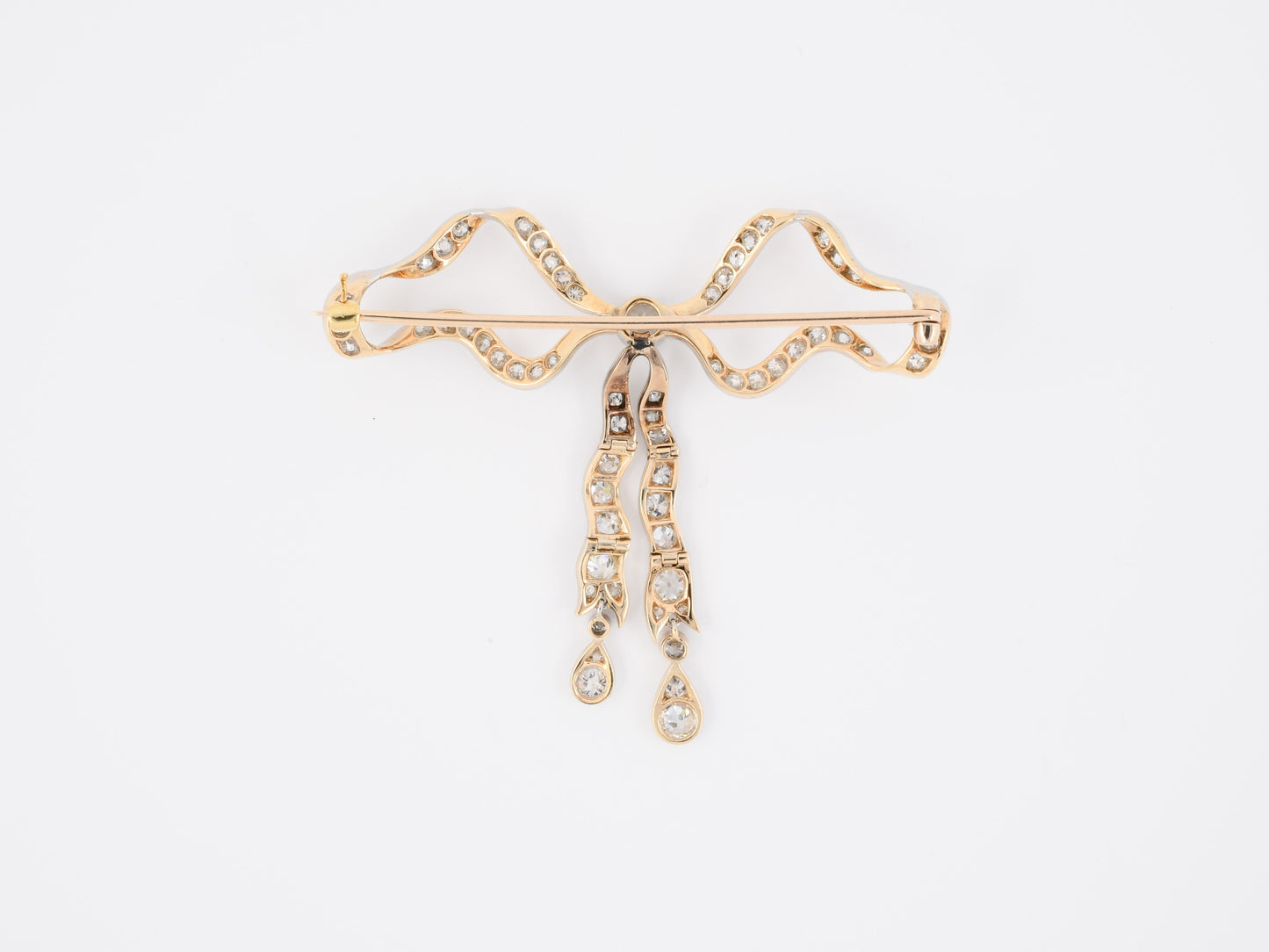 23138 - SOLD - Edwardian Platinum Gold Diamond Flexible Bow Pin