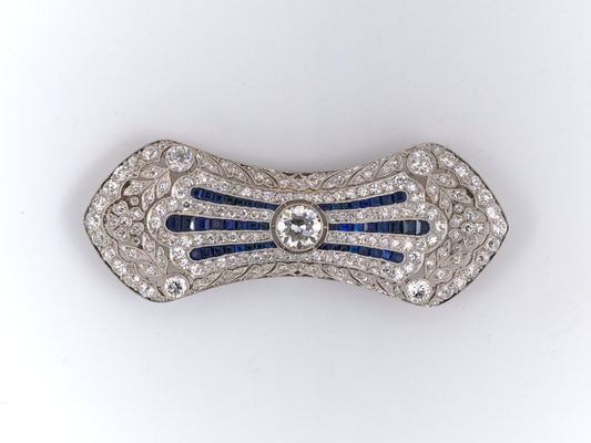 23610 - Edwardian T B Starr Platinum Diamond Sapphire Filigree Bow Pin