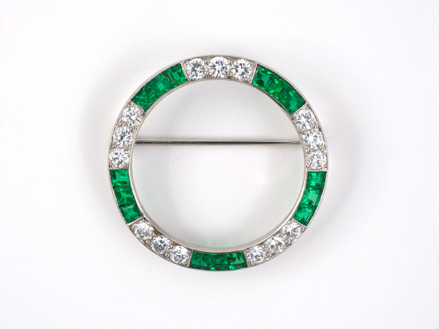 24061 - SOLD - Circa 1950, Yard Platinum Diamond Emerald Circle Pin