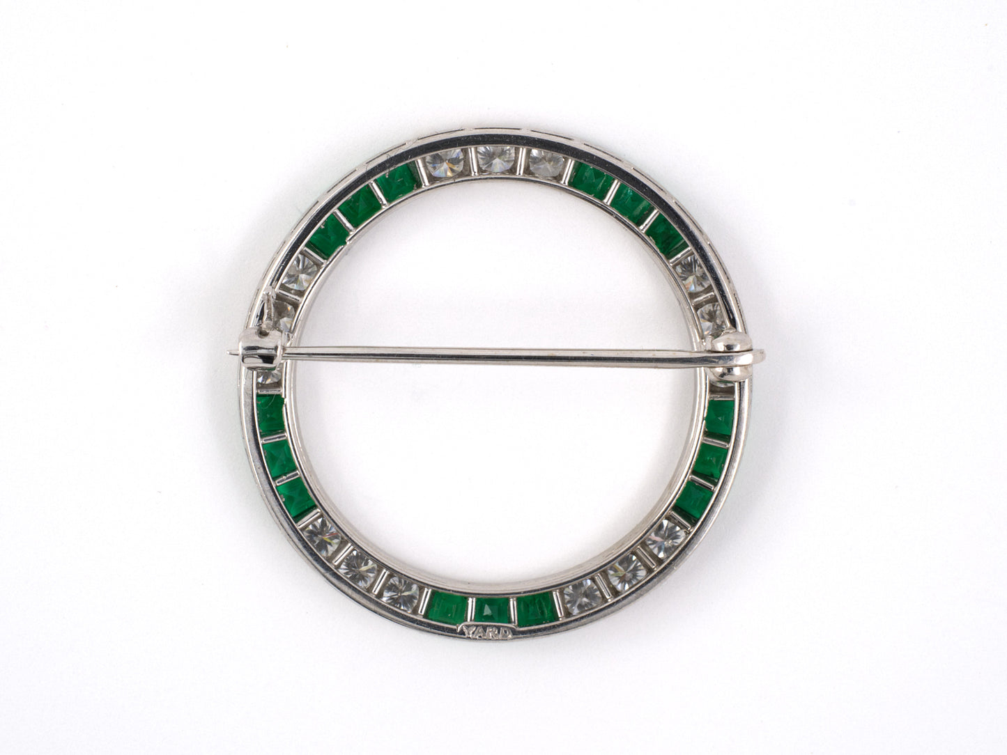 24061 - SOLD - Circa 1950, Yard Platinum Diamond Emerald Circle Pin