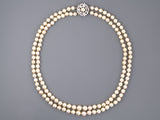 43801 - Platinum Diamond Graduated Pearl Necklace