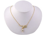 45138 - Gold GIA Diamond Ruby Carved Snake Pendant Necklace