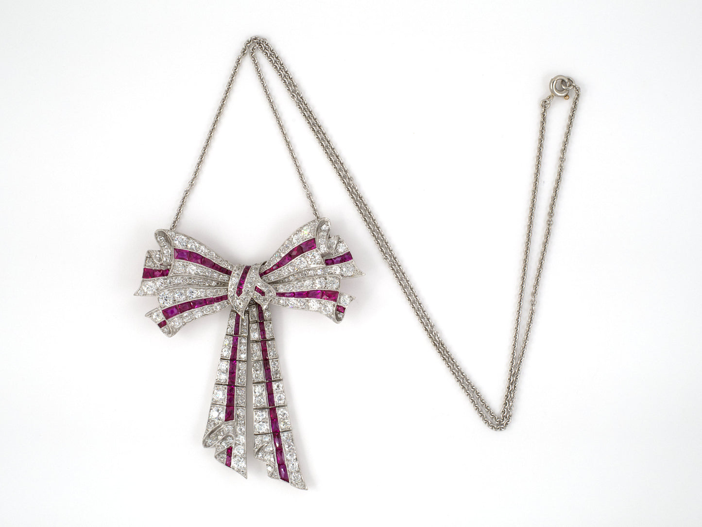 45295 - Edwardian Platinum Diamond Ruby Bow Pin Pendant Necklace