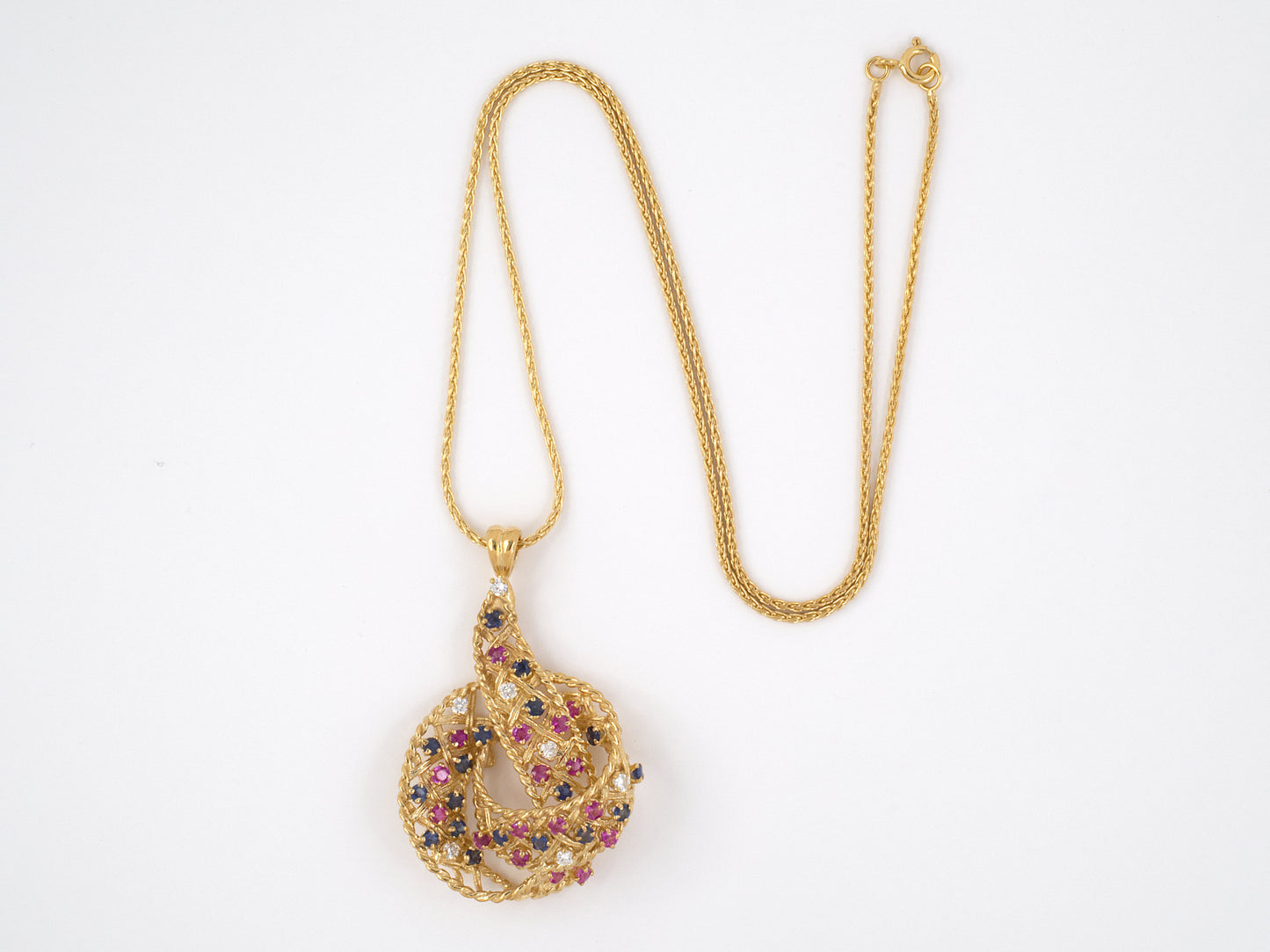 45422 - SOLD - Circa 1950 Gold Diamond Ruby Sapphire Swirling Ribbon Pendant Necklace