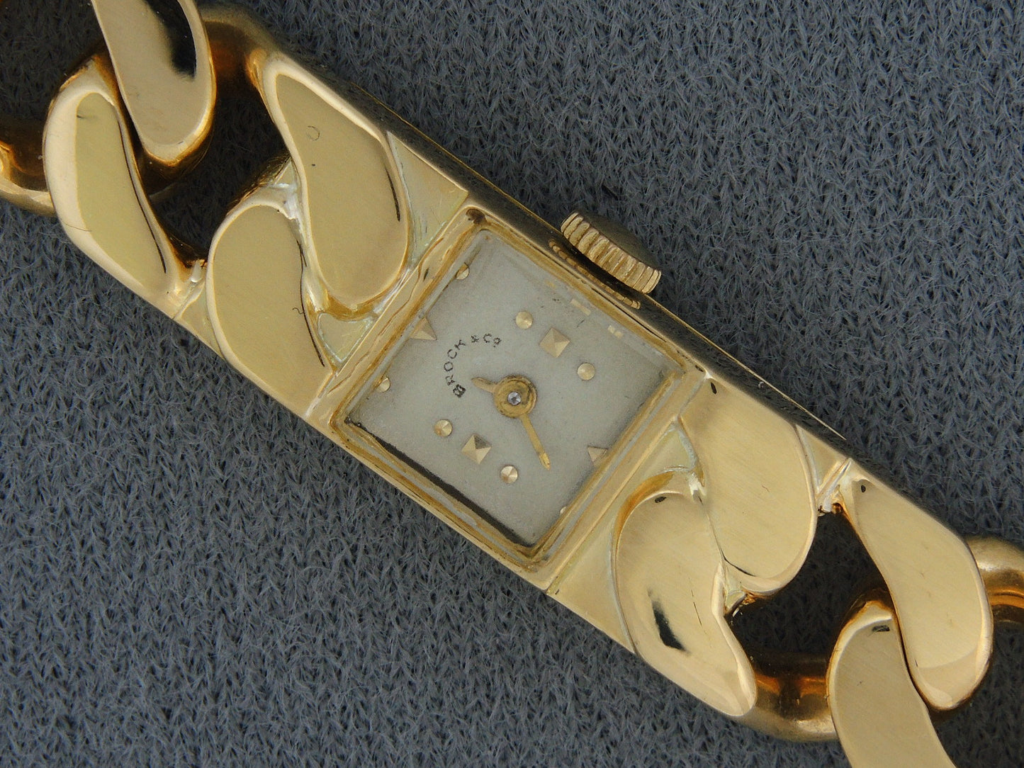 61311 - Circa 1950 Brock & Co Gold French Curb Link Watch