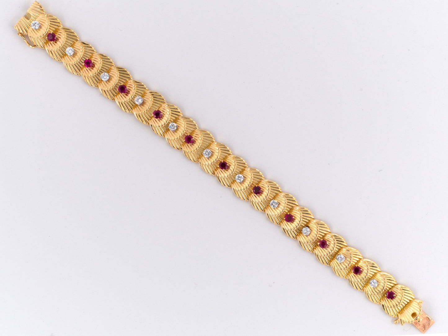 72621 - Circa 1955 Van Cleef & Arpels Platinum Gold Ruby Diamond French Link Bracelet