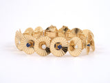 72661 - Circa 1950 Gold Sapphire Diamond Grooved Circle Bracelet