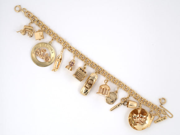 72667 - Circa 1965 Gold Spiral Travel Charm Bracelet