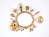 72667 - Circa 1965 Gold Spiral Travel Charm Bracelet