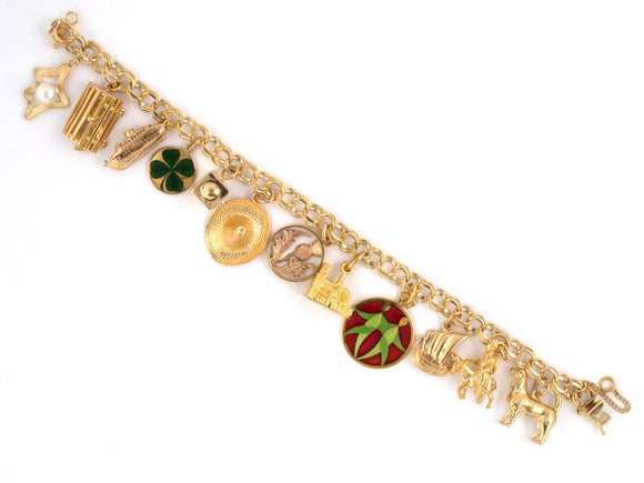 72669 - SOLD - Circa 1970 Gold Spiral Travel Charm Bracelet