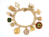 72669 - SOLD - Circa 1970 Gold Spiral Travel Charm Bracelet