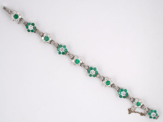 72852 - Circa1970s Platinum Diamond Emerald Floral Bracelet